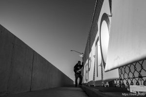 (Trent Nelson  |  The Salt Lake Tribune) Romy Colvin at an anti-ICE protest on a West Valley City overpass on Friday, Oct. 31, 2025.
