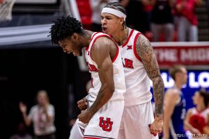 (Trent Nelson  |  The Salt Lake Tribune) Utah Utes guard Don McHenry (3) and Utah Utes guard Terrence Brown (2) celebrate McHenry's three-pointer to force overtime as Utah hosts Weber State, NCAA basketball in Salt Lake City on Saturday, Nov. 8, 2025.