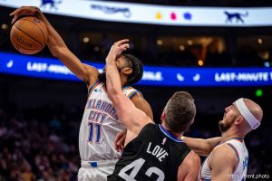 (Trent Nelson  |  The Salt Lake Tribune) Utah Jazz forward Kevin Love (42) fouls Oklahoma City Thunder guard Isaiah Joe (11) as the Utah Jazz host the Oklahoma City Thunder, NBA basketball in Salt Lake City on Friday, Nov. 21, 2025.