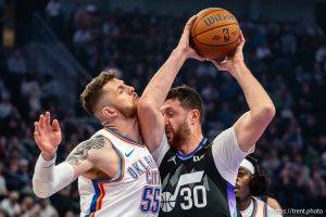 (Trent Nelson  |  The Salt Lake Tribune) Utah Jazz center Jusuf Nurkic (30) collides with Oklahoma City Thunder center Isaiah Hartenstein (55) as the Utah Jazz host the Oklahoma City Thunder, NBA basketball in Salt Lake City on Friday, Nov. 21, 2025.