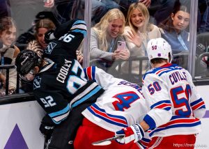 (Trent Nelson  |  The Salt Lake Tribune) Utah Mammoth center Logan Cooley (92) and New York Rangers defenseman Braden Schneider (4) as the Utah Mammoth host the New York Rangers in Salt Lake City on Saturday, Nov. 22, 2025.