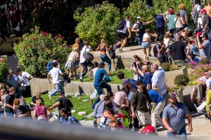 (Trent Nelson  |  The Salt Lake Tribune) People react after Charlie Kirk is shot during an appearance at Utah Valley University in Orem on Wednesday, Sept. 10, 2025.