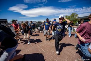 (Trent Nelson  |  The Salt Lake Tribune) People react after Charlie Kirk is shot during an appearance at Utah Valley University in Orem on Wednesday, Sept. 10, 2025.
