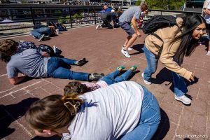 (Trent Nelson  |  The Salt Lake Tribune) People react after Charlie Kirk is shot during an appearance at Utah Valley University in Orem on Wednesday, Sept. 10, 2025.
