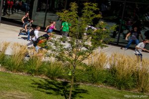 (Trent Nelson  |  The Salt Lake Tribune) People react after Charlie Kirk is shot during an appearance at Utah Valley University in Orem on Wednesday, Sept. 10, 2025.