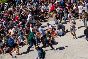 (Trent Nelson  |  The Salt Lake Tribune) People react after Charlie Kirk is shot during an appearance at Utah Valley University in Orem on Wednesday, Sept. 10, 2025.