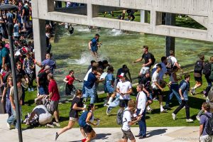 (Trent Nelson  |  The Salt Lake Tribune) People react after Charlie Kirk is shot during an appearance at Utah Valley University in Orem on Wednesday, Sept. 10, 2025.