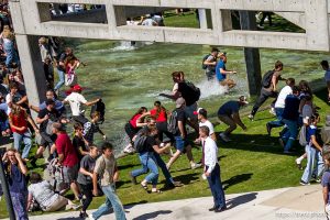 (Trent Nelson  |  The Salt Lake Tribune) People react after Charlie Kirk is shot during an appearance at Utah Valley University in Orem on Wednesday, Sept. 10, 2025.