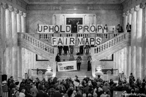 (Trent Nelson  |  The Salt Lake Tribune) People gather at the Utah Capitol prior to a special session on redistricting and the anti-public union bill in Salt Lake City on Tuesday, Dec. 9, 2025.