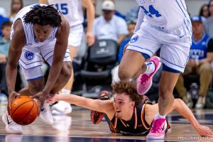 (Trent Nelson  |  The Salt Lake Tribune) BYU Cougars guard Robert Wright III (1) picks up a loose ball as BYU hosts Pacific, NCAA basketball in Provo on Tuesday, Dec. 16, 2025.