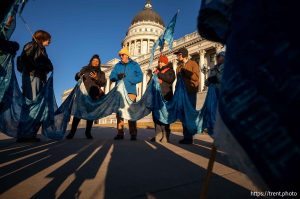 (Trent Nelson  |  The Salt Lake Tribune) A vigil for the Great Salt Lake at the Utah Capitol in Salt Lake City on Tuesday, Jan. 20, 2026. The event and march around the building were organized by the Making Waves Artist Collaborative.