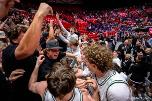(Trent Nelson  |  The Salt Lake Tribune) Olympus celebrates their win over Bountiful in the 5A state championship game, high school basketball in Salt Lake City on Friday, Feb. 27, 2026.