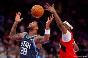 (Trent Nelson  |  The Salt Lake Tribune) Utah Jazz forward Brice Sensabaugh (28) loses the ball, defended by Toronto Raptors guard Ja'kobe Walter (14) as the Utah Jazz host the Toronto Raptors, NBA basketball in Salt Lake City on Monday, March 23, 2026.