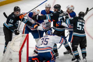 (Trent Nelson  |  The Salt Lake Tribune) Players grapple as the Utah Mammoth host the Edmonton Oilers, NHL hockey in Salt Lake City on Tuesday, March 24, 2026.