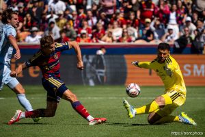 (Trent Nelson  |  The Salt Lake Tribune) Sporting Kansas City goalkeeper John Pulskamp (1) blocks a shot by Real Salt Lake forward Sergi Solans (22) as Real Salt Lake hosts Sporting Kansas City, MLS soccer in Sandy on Saturday, April 4, 2026.