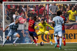 (Trent Nelson  |  The Salt Lake Tribune) Real Salt Lake forward Sergi Solans (22) scores on Sporting Kansas City goalkeeper John Pulskamp (1) as Real Salt Lake hosts Sporting Kansas City, MLS soccer in Sandy on Saturday, April 4, 2026.
